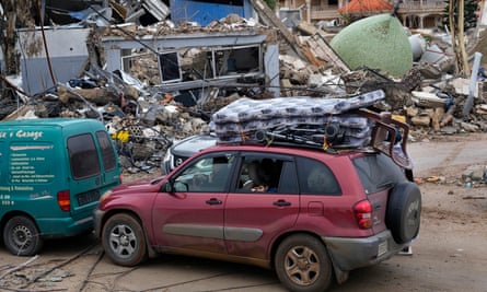Displaced residents returning in vehicles to their homes in the town of Bint Jbeil, southern Lebanon.