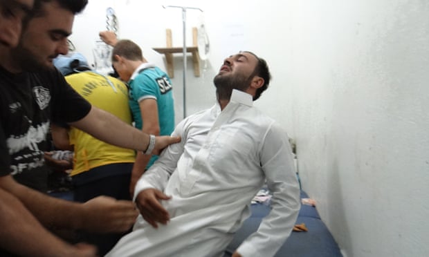 A man is treated at the Sahra hospital in Saraqeb on 1 August.