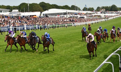 Seamie Heffernan rides Anthony Van Dyck to victory along the inside rail at Epsom.