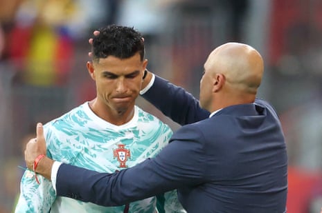 Cristiano Ronaldo and Roberto Martínez.