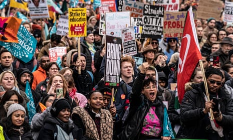 Thousands of NEU and PCS members take part in a national strike demonstration in central London.