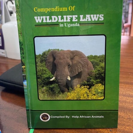 The cover of the book on Ugandan wildlife laws, showing an elephant 