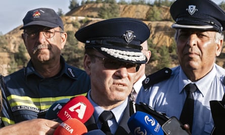 Cyprus police chief, Kypros Michaelides, speaks during the search for bodies of victims.