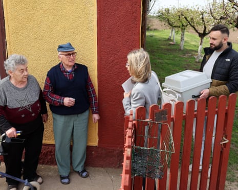 Election officials brought a mobile urn to an elderly couple during the general election in the outskirts of Békéscsaba, Hungary.