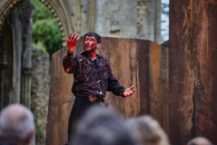 Ronnie Yorke, bloodied and harrowed as Macbeth, at Glastonbury Abbey