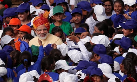 Modi greets schoolchildren after addressing the nation from the Red Fort.