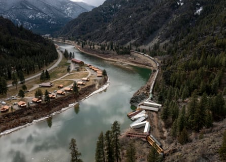 A 25-car train derailment left a difficult mess across on the Clark Fork River in western Montana.