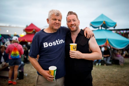 They huge for a photo, each with a beer in hand