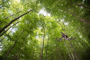 A mountain biker jumps at the Rinne track near Darmstadt, southern Germany