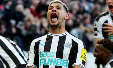 Newcastle’s Bruno Guimaraes celebrates wildly while somehow keeping a lump of chewing gum in his mouth.