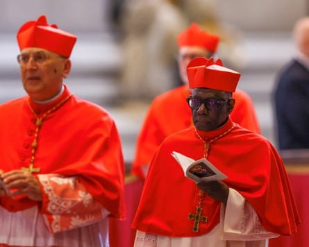 Cardinal Robert Sarah arrives in Saint Peter’s Basilica, as the coffin of Francis inside in April.