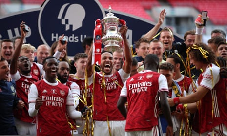 Pierre-Emerick Aubameyang lifts the FA Cup at Wembley.