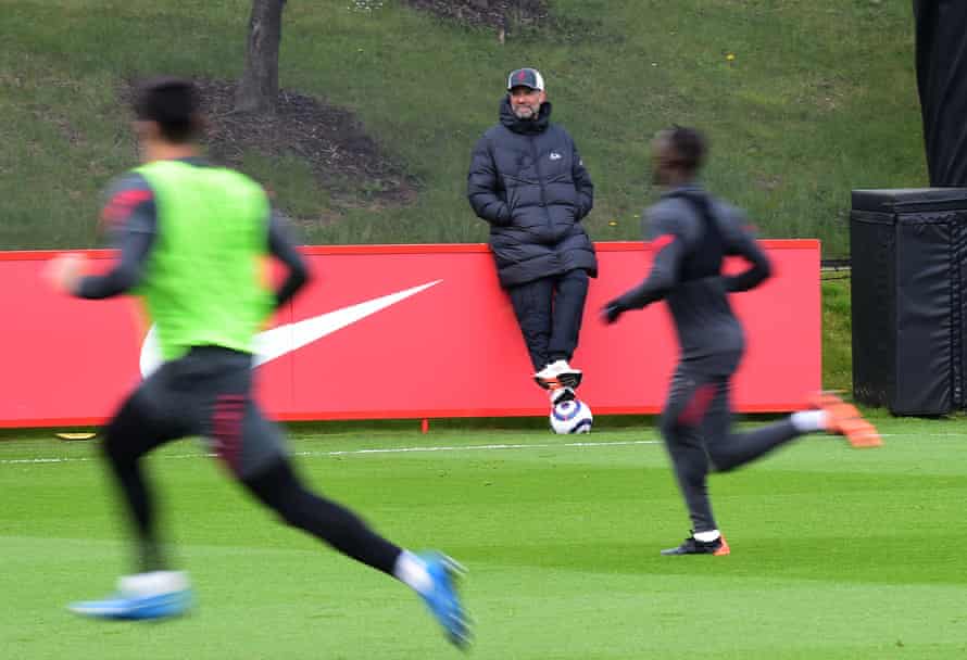 Jürgen Klopp takes in a Liverpool training session.