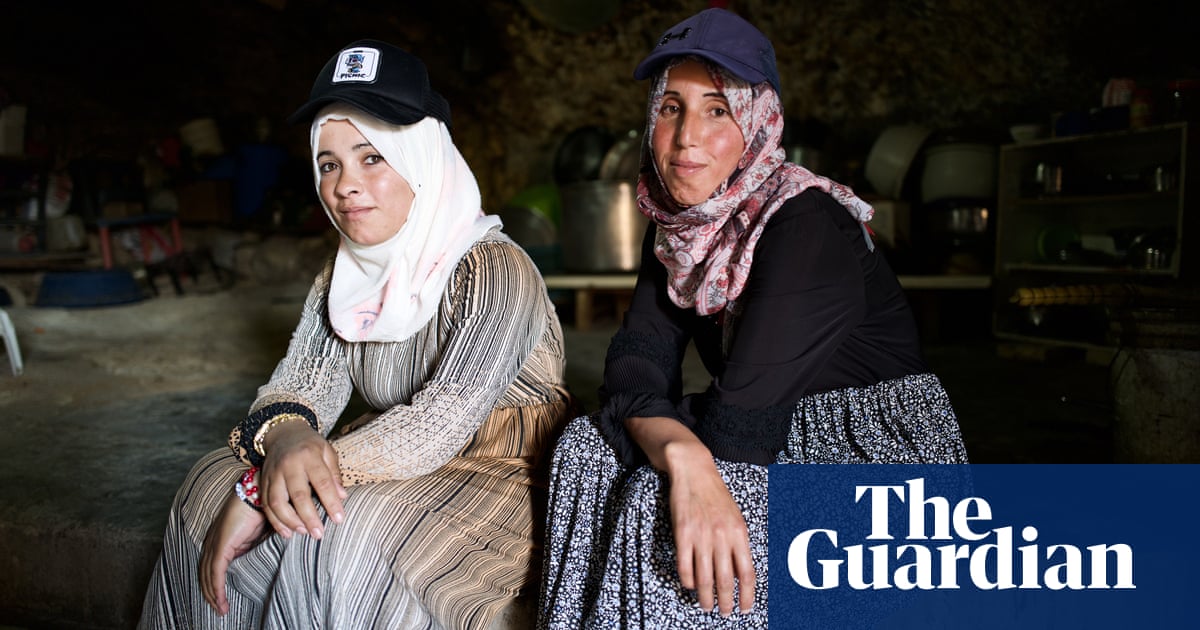 ‘It’s 2022 and we live in caves’: herders besieged by settlers on West Bank but still clinging to hope