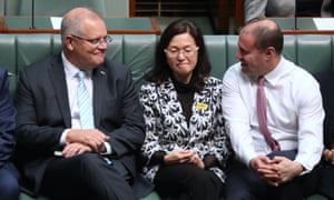 Scott Morrison, Gladys Liu and Josh Frydenberg sit together in parliament