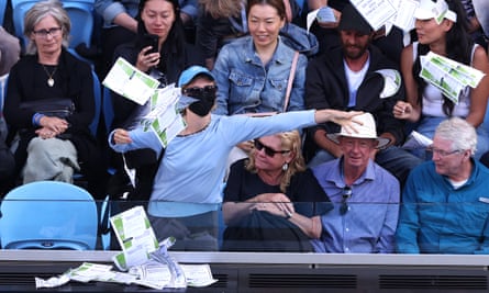 A protestor throws Free-Palestine pamphlets on the court during the men’s singles match between Germany’s Alexander Zverev and Britain’s Cameron Norrie.