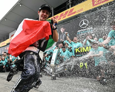 Mercedes’s driver Kimi Antonelli celebrates with his team after winning the Japanese Grand Prix.