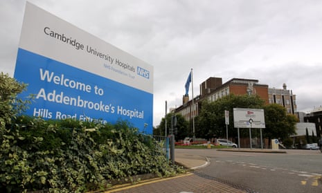 A large sign by the road saying 'Welcome to Addenbrooke's Hospital'