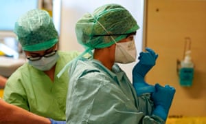 A medical worker in protective gear