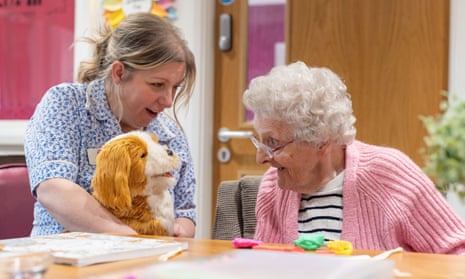 It’s almost magical': how robotic pets are helping UK care home
