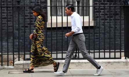 Rishi Sunak, Chancellor of the Exchequer and his wife Akshata Murthy leave No.10 Downing Street. 14 Aug 2020