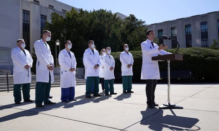 Doctors outside Walter Reed medical center on Saturday.