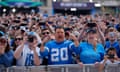 Fans cheer during the third day of the NFL draft on Saturday in Detroit.