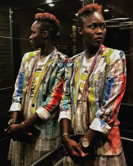 Model and designer Sachakara Dieng wears one of her creations in an elevator in Dakar, December 2018