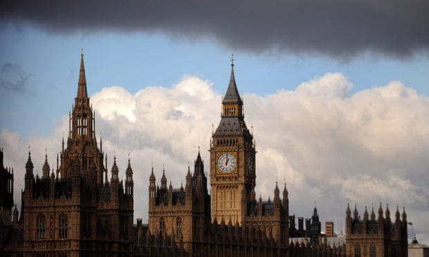 The houses of parliament under a gloomy, cloudy sky