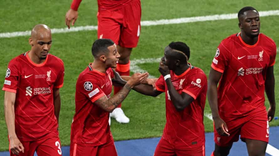 Liverpool’s Thiago Alcantara (centre left) and Sadio Mane exchange opinions as they leave the pitch at half-time.