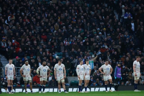 The England players look dejected after Charles Ollivon of France (not pictured ) scores his team’s third try towards the end of the first half.