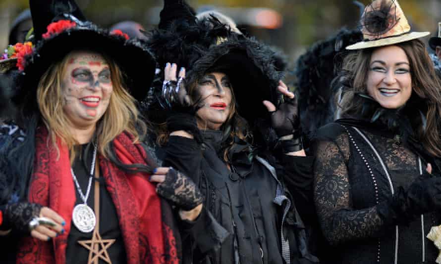 Revellers take part in a Halloween festival during the Salem witches’ magic circle at Salem Common, Massachusetts, on 31 October 2018.