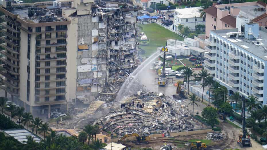 Rescue personnel work at the remains of the Champlain Towers South.