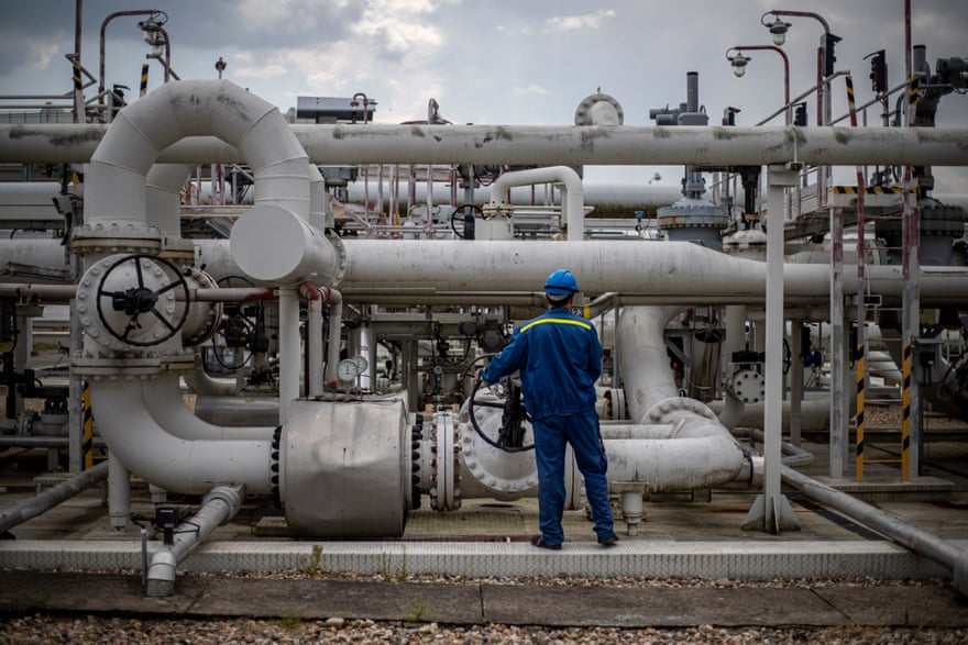 An employee checks pipelines at the central oil tank farm in Czech Republic