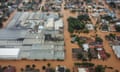 FILE - Streets are flooded after heavy rain in Sao Sebastiao do Cai, Rio Grande do Sul state, Brazil.