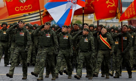 Russian service members, who were involved in the country's military campaign in Ukraine, march in columns during a military parade on Victory Day, which marks the 79th anniversary of the victory over Nazi Germany in World War Two, in Red Square in Moscow, Russia, May 9, 2024.