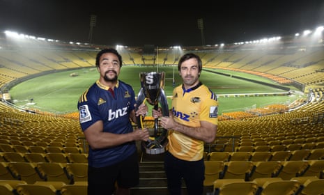 Opposing captains Nasi Manu and Conrad Smith pose with the Super Rugby trophy at Westpac Stadium.
