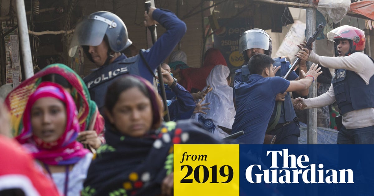 Bangladesh strikes: thousands of garment workers clash with police ...