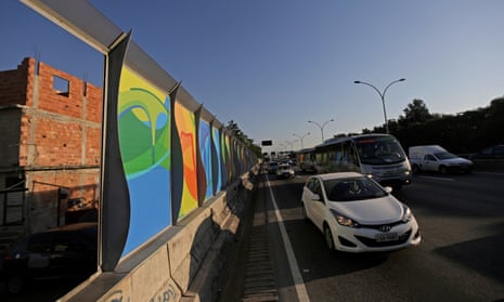 Banners advertising the 2016 Rio Olympics near Maré on the Linha Vermelha freeway connecting Galeão airport with Rio’s downtown and south Zone.
