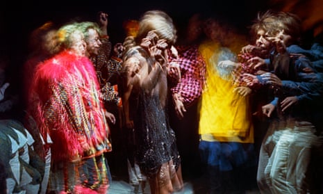 A time-exposure view of dancers under the influence of LSD.