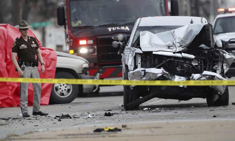 Law enforcement personnel work the scene of a crash on 25 February 2021, in Tulsa, Oklahoma.