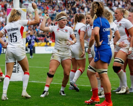 England’s Meg Jones celebrates after scoring a try.