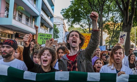 Demonstrators against climate failure storm the Order of Accountants in Lisbon on Saturday.