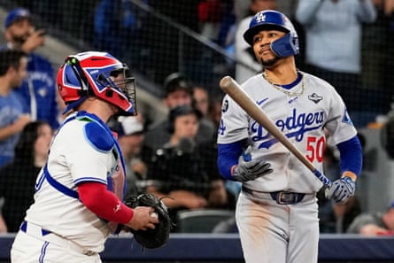 The Dodgers’ Mookie Betts reacts after striking out against the Blue Jays to end Game 1.