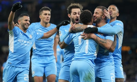 Manchester City celebrate Raheem Sterling’s equaliser against PSG