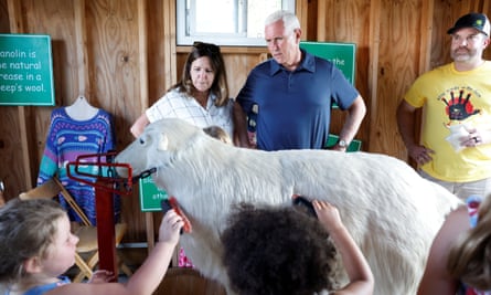 Former vice-president Mike Pence and wife Karen visit the children’s section of the Iowa state fair.