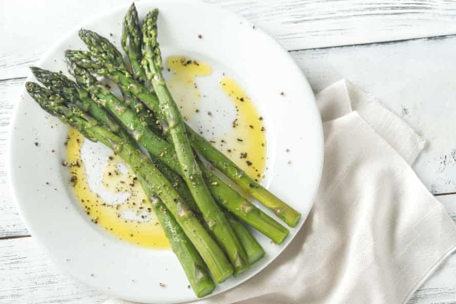 Steamed asparagus, using damp kitchen roll in a microwave.
