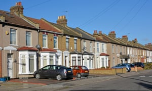 Houses with front gardens have given over to paved hardstandings for cars.