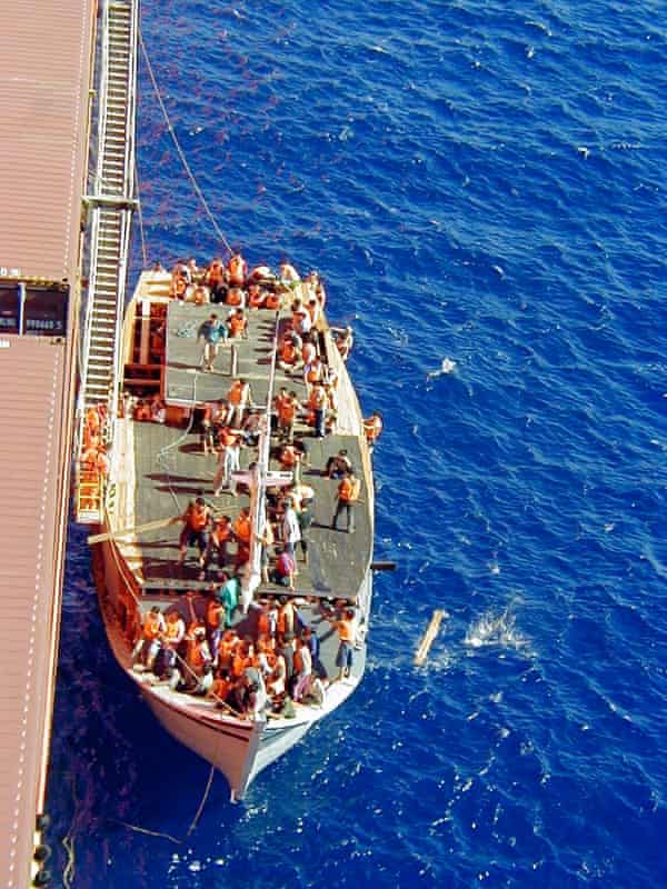 An Indonesian ferry carrying 438 asylum seekers pulls alongside the Tampa.