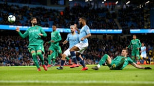 Raheem Sterling puts Manchester City ahead after the referee and linesman decided he was not offside.